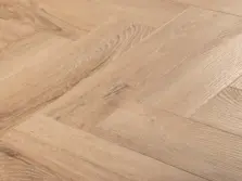 View of Weathered Oak (Herringbone) luxury vinyl tile by Textures LVT