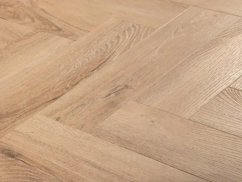 View of Weathered Oak (Herringbone) luxury vinyl tile by Textures LVT