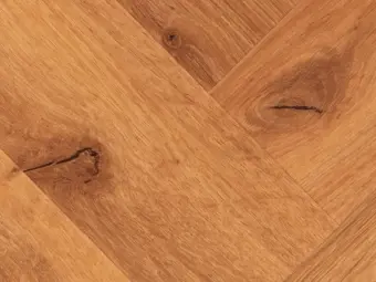 View of Honey Oak (Herringbone) luxury vinyl tile by Textures LVT
