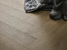 View of Light Oak (Herringbone) luxury vinyl tile by Textures LVT