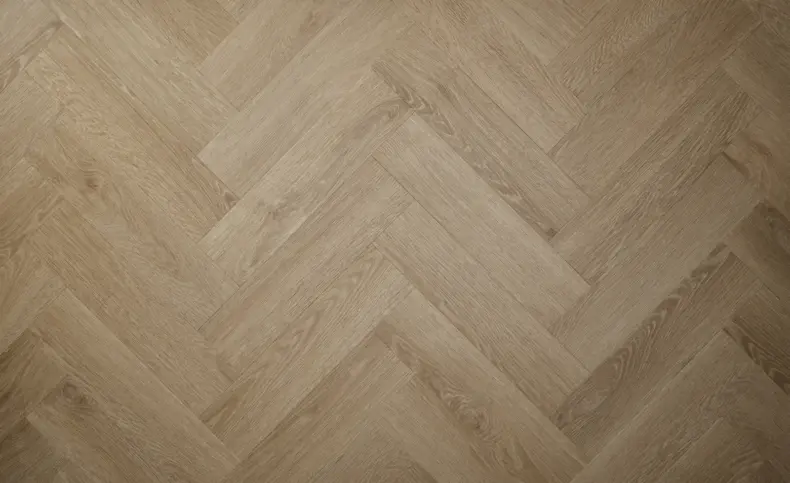 View of Light Oak (Herringbone) luxury vinyl tile by Textures LVT