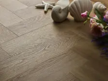 View of Summer Oak (Herringbone) luxury vinyl tile by Textures LVT