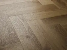 View of Summer Oak (Herringbone) luxury vinyl tile by Textures LVT