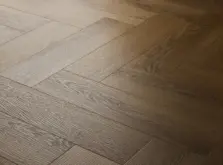 View of Traditional Oak (Herringbone) luxury vinyl tile by Textures LVT