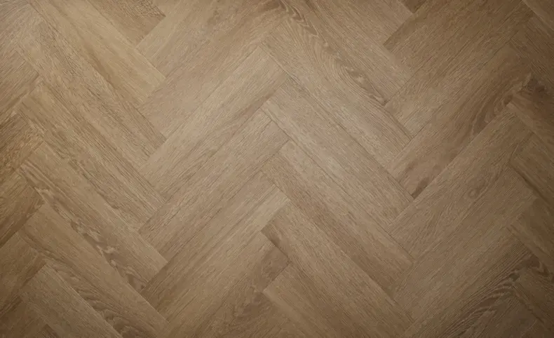 View of Cottage Oak (Herringbone) luxury vinyl tile by Textures LVT