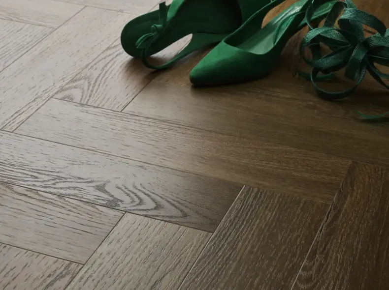 View of Aged Oak (Herringbone) luxury vinyl tile by Textures LVT