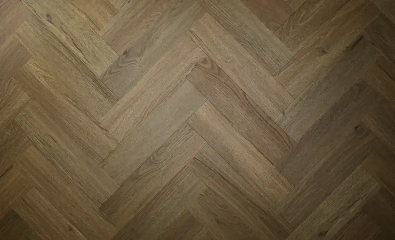 View of Aged Oak (Herringbone) luxury vinyl tile by Textures LVT