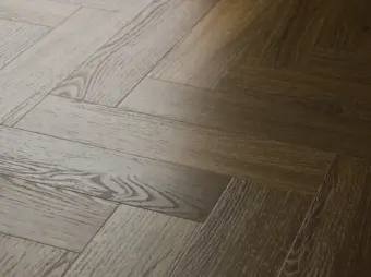 View of Aged Oak (Herringbone) luxury vinyl tile by Textures LVT