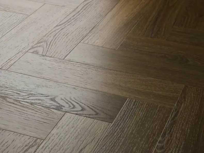 View of Aged Oak (Herringbone) luxury vinyl tile by Textures LVT