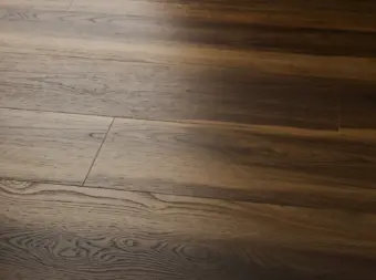View of Warm Walnut (Plank) luxury vinyl tile by Textures LVT