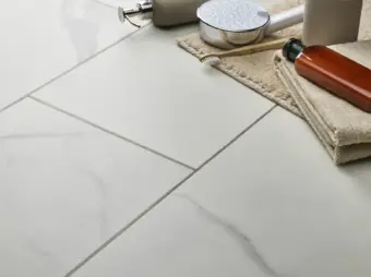 View of Carrera White (Stone) luxury vinyl tile by Textures LVT