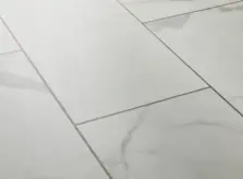 View of Carrera White (Stone) luxury vinyl tile by Textures LVT