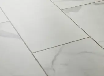 View of Carrera White (Stone) luxury vinyl tile by Textures LVT