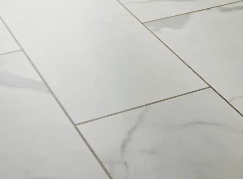 View of Carrera White (Stone) luxury vinyl tile by Textures LVT