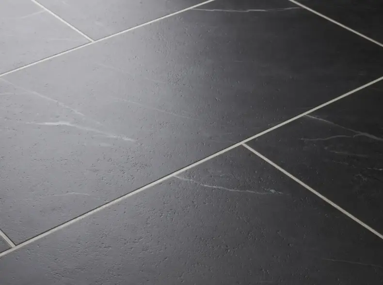 View of Carrera Dark (Stone) luxury vinyl tile by Textures LVT