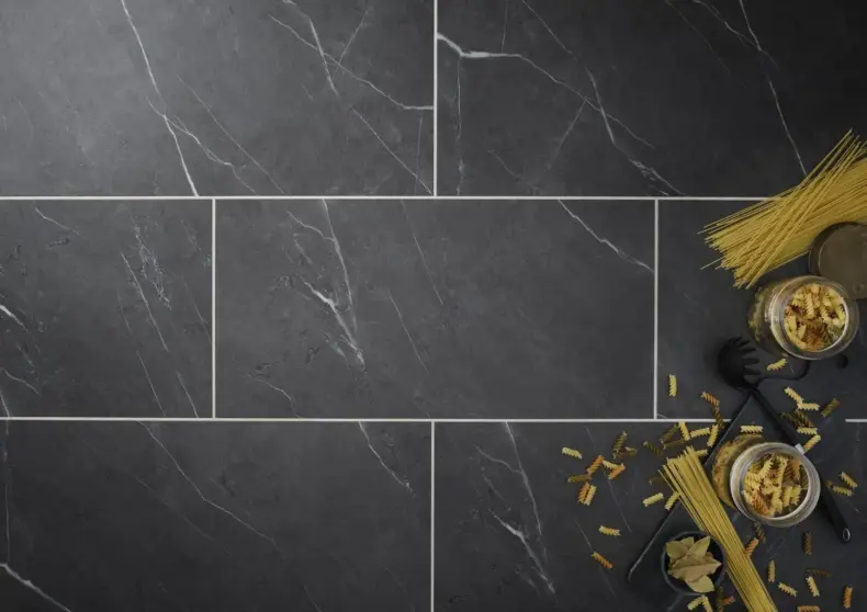 View of Carrera Dark (Stone) luxury vinyl tile by Textures LVT
